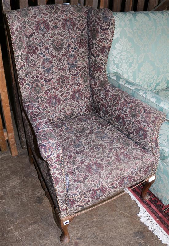 Upholstered wing armchair